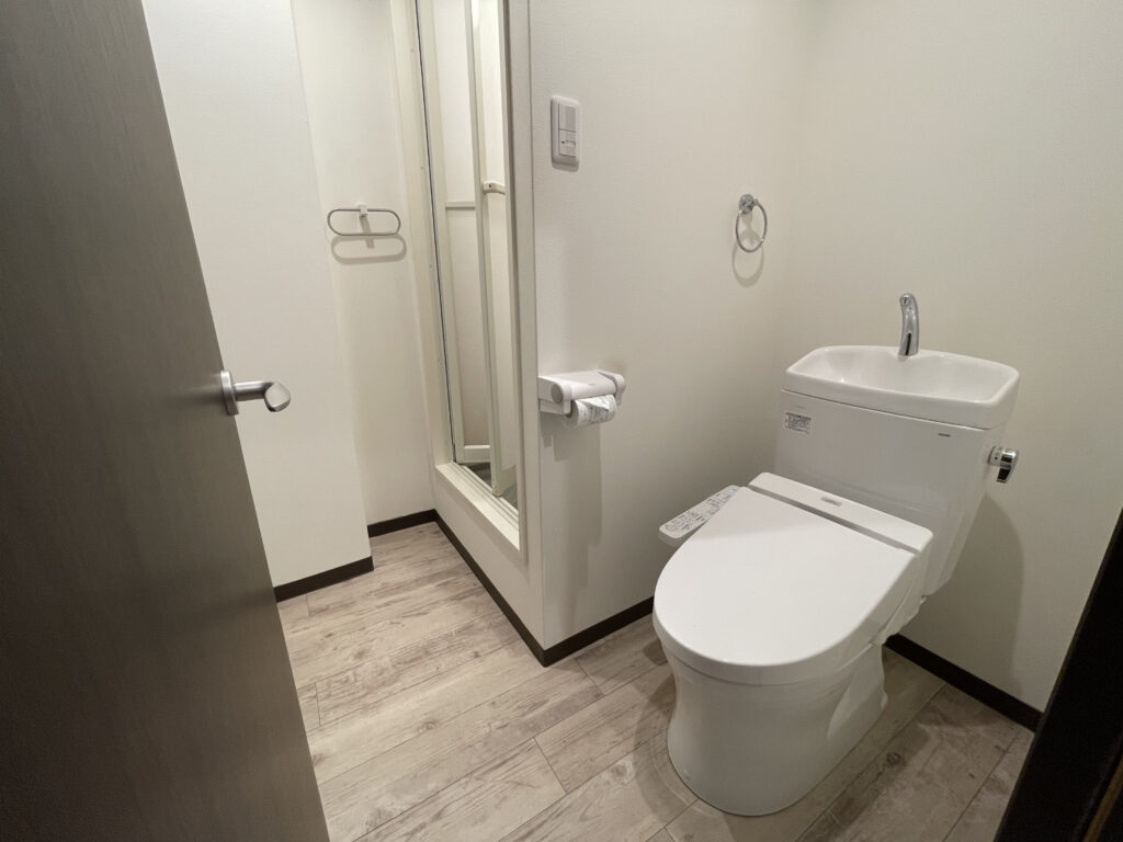 Shower booth and toilet